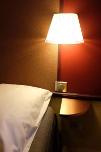 Hotels Hotel Marignan : Chambre Quadruple avec Douche et Toilettes Privatives