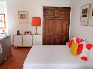 Appartements le 1835, studio rouge-Corail : photos des chambres