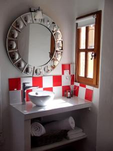 Appartements le 1835, studio rouge-Corail : photos des chambres