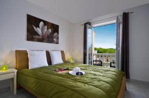 Villages vacances Domaine Le Clos des Oliviers : photos des chambres