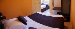 Hotels Hotel du Commerce : Chambre Triple