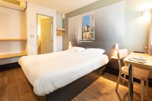 Hotels B&B HOTEL Laval Change : photos des chambres