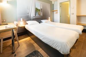 Hotels B&B HOTEL Laval Change : photos des chambres