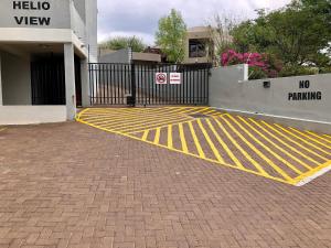 Helioview Suites - 2BR modern apartment with secure parking