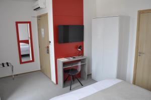 Hotels Les Tonnelles : photos des chambres