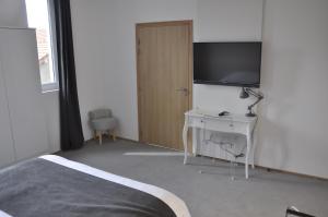 Hotels Les Tonnelles : photos des chambres