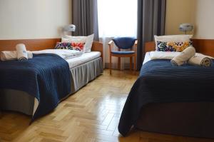Twin Room room in Kosmopolita Rooms