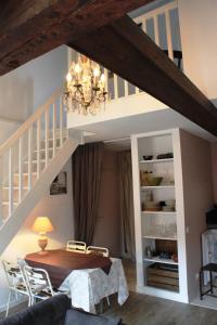 Appartements Au calme en vieille ville - Proche lac - Ambiance esprit brocante : photos des chambres