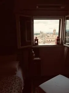 Casa tipica siciliana patronale home BedandBreakfast TreMetriSoprailCielo Camere con vista, colazione interna in terrazzo panoramico - 卡尔塔吉罗