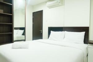 New Homey 2BR Brooklyn Alam Sutera Apartment By Travelio