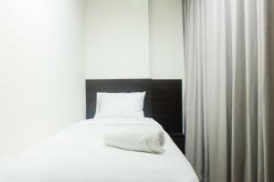 New Homey 2BR Brooklyn Alam Sutera Apartment By Travelio