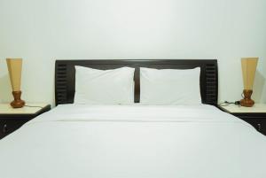 2BR with Study Room at LAvenue Apartment By Travelio