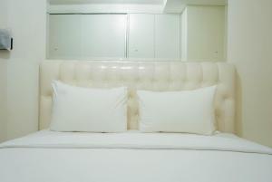 2BR with Study Room at LAvenue Apartment By Travelio