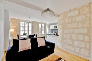 Appartements Les Halles et Hauteurs by Cocoonr : photos des chambres