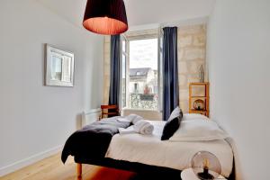 Appartements Les Halles et Hauteurs by Cocoonr : photos des chambres