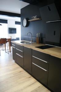 Appartements Le 1777 : photos des chambres