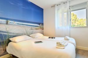 Hotels Les Vagues Hotel Restaurant : photos des chambres