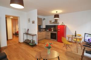 Appartements Au buisson de roses : photos des chambres