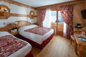 Hotels Chalet-Hotel Neige et Roc, The Originals Relais (Hotel-Chalet de Tradition) : photos des chambres