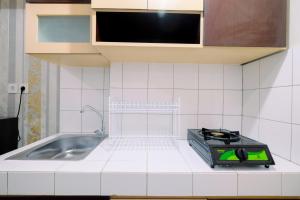 Cozy Studio Springlake Summarecon Bekasi Apartment By Travelio