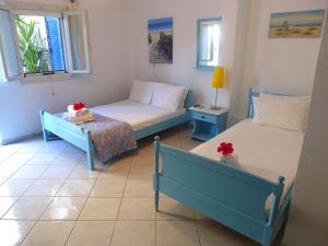 Studio (3 Adults) room in Mania Rooms and Studios