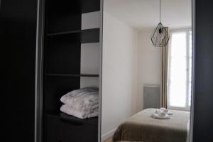Appartements LE VOLTAIRE COLMAR CENTRE : photos des chambres