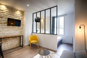 Appartements MON LOFT NIORTAIS - Le PETIT ROC : photos des chambres