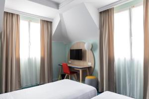 Hotels Grand Magic Hotel Marne La Vallee : photos des chambres