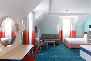 Hotels Grand Magic Hotel Marne La Vallee : photos des chambres