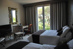 Hotels Les Aubuns Country Hotel : photos des chambres