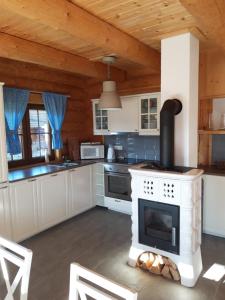 Jafura-dovolenkový zrubový dom na brehu Liptovskej Mary