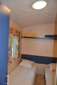 Campings Mobile home des pins : photos des chambres