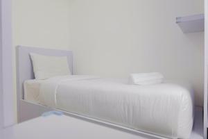 Spacious and Clean 3BR Bassura City Apartment By Travelio