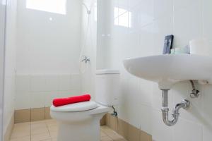 Spacious and Clean 3BR Bassura City Apartment By Travelio