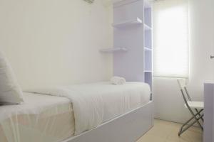 Spacious and Clean 3BR Bassura City Apartment By Travelio