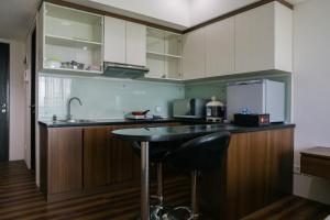 City View Studio Apartment at Tamansari La Grande By Travelio