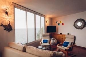 Canary casita next to the Atlantic Ocean