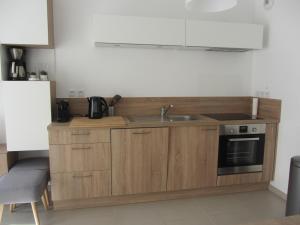 Appartements Georges Beach Appart : photos des chambres