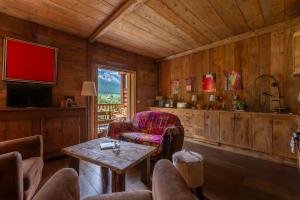 Appartements Le Refuge de Serre-Chevalier, dans un esprit chalet, commune de Le Monetier-les-Bains : photos des chambres