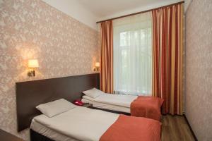 Standard Twin Room room in Pervomayskaya Hotel