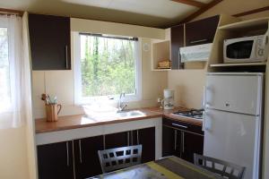 Campings Camping Familial, paisible, mobil home , chalet & emplacement nue : photos des chambres