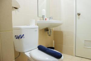 Direct Access to Pool 2BR Apartment at Parahyangan Residence By Travelio