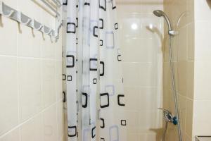 Direct Access to Pool 2BR Apartment at Parahyangan Residence By Travelio