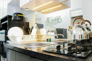 Direct Access to Pool 2BR Apartment at Parahyangan Residence By Travelio