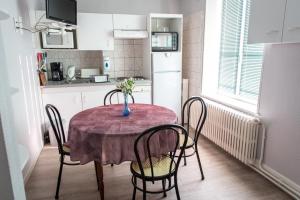 Appartements Aux Studios du Parc : photos des chambres