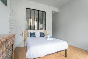 Appartements Apartments WS Saint-Lazare - Opera : photos des chambres