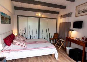 B&B / Chambres d'hotes Les Yeux Bleus Bed & Breakfast : photos des chambres