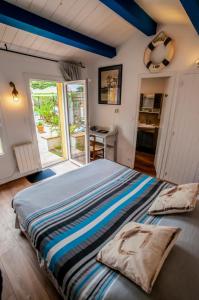 B&B / Chambres d'hotes Les Yeux Bleus Bed & Breakfast : photos des chambres