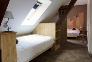 B&B / Chambres d'hotes La Griffe a Foin au Restaurant raisin D'or : photos des chambres