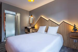 Hotels Hotel Base Camp Lodge - Bourg Saint Maurice : photos des chambres